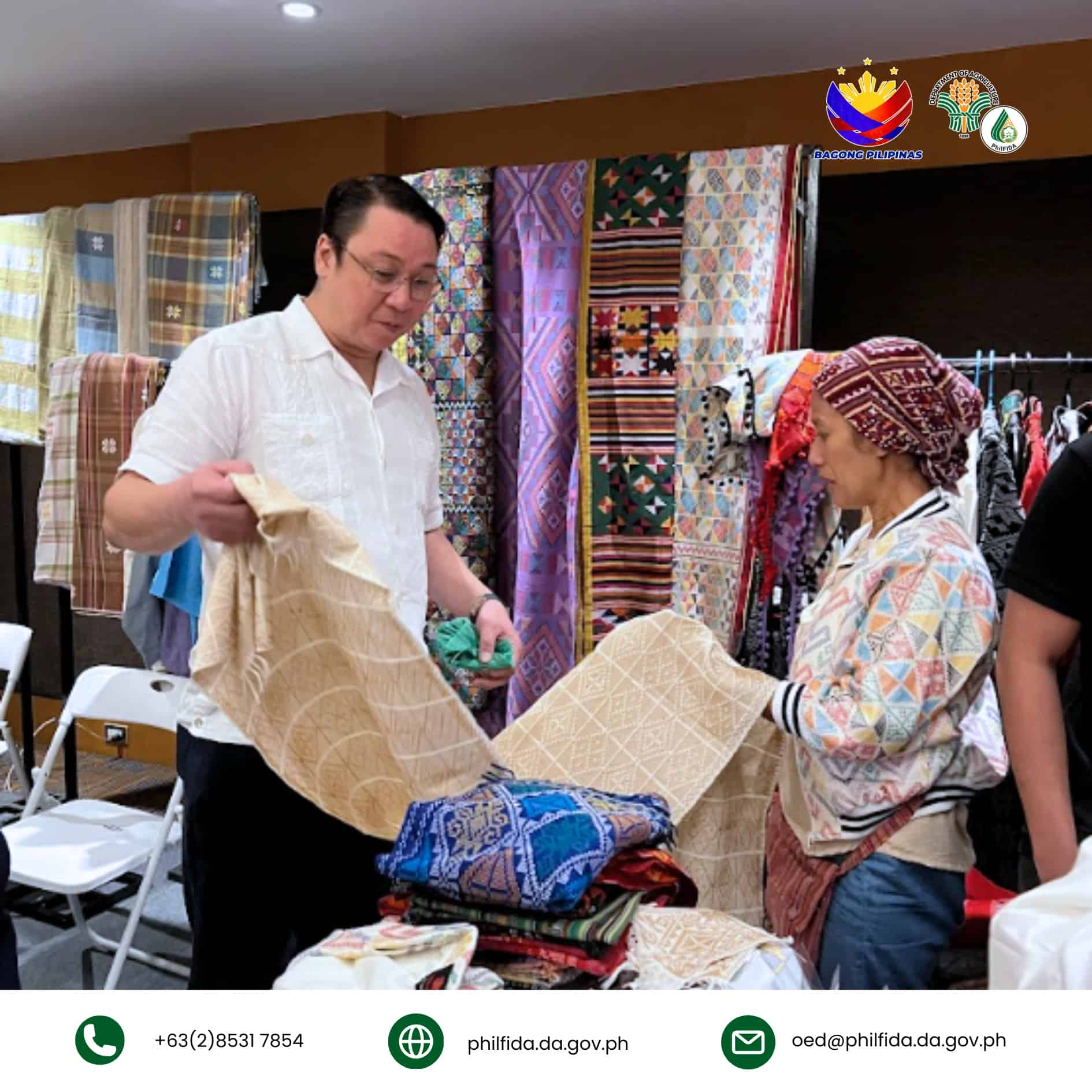 A man interacting with a fiber cloth seller.