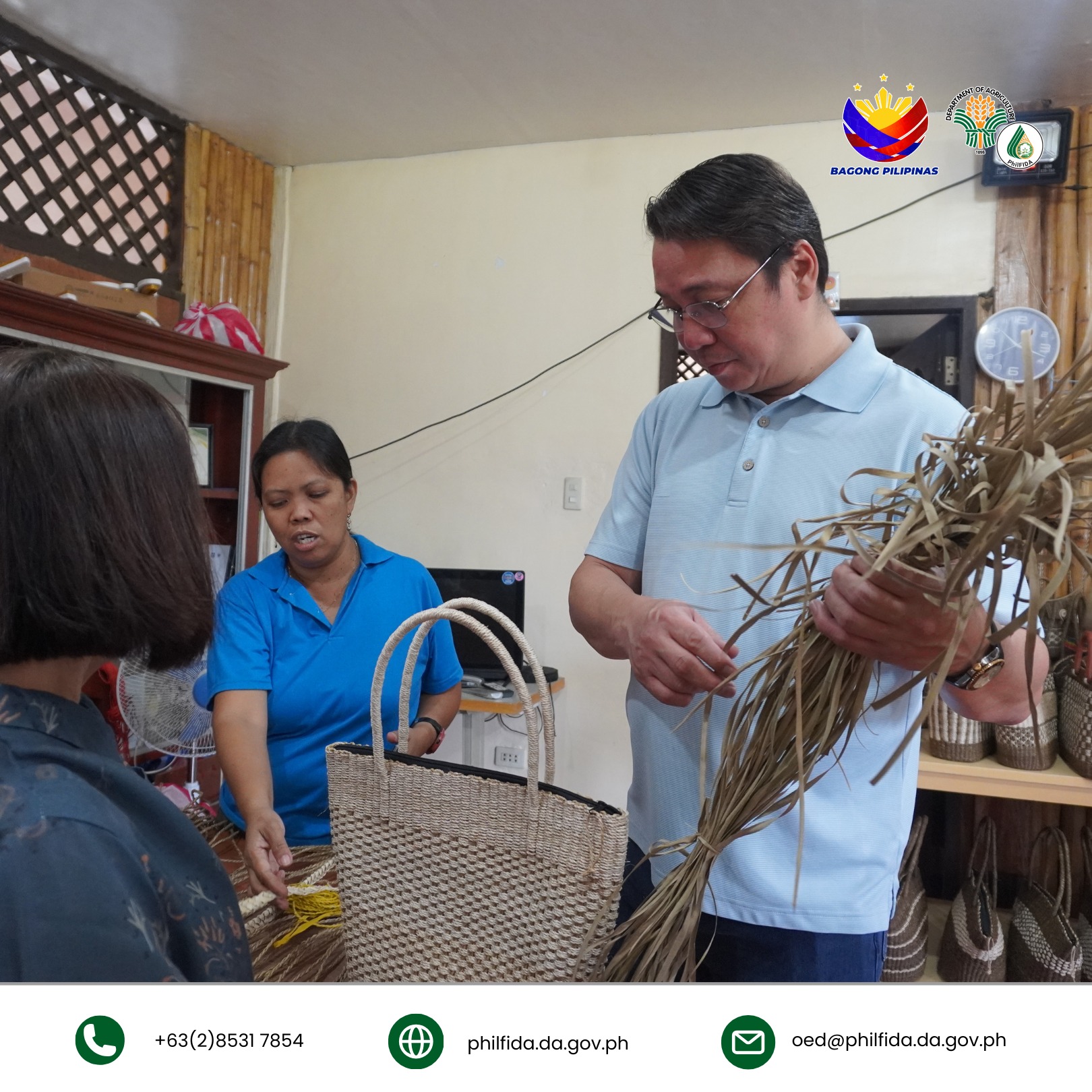 A man closely inspecting a bariw handicraft, examining its intricate weaving and texture.