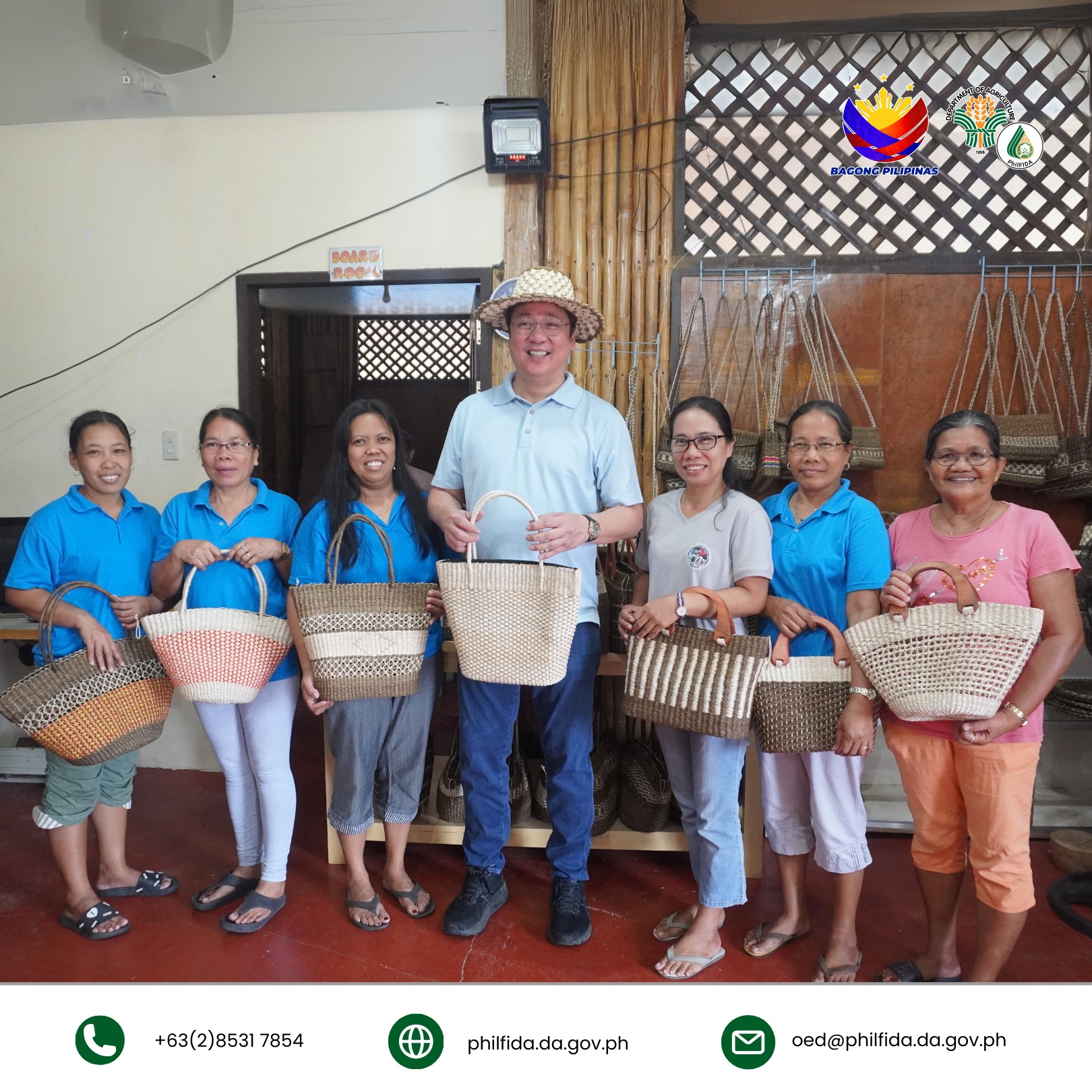 A group picture of people promoting handicrafts.